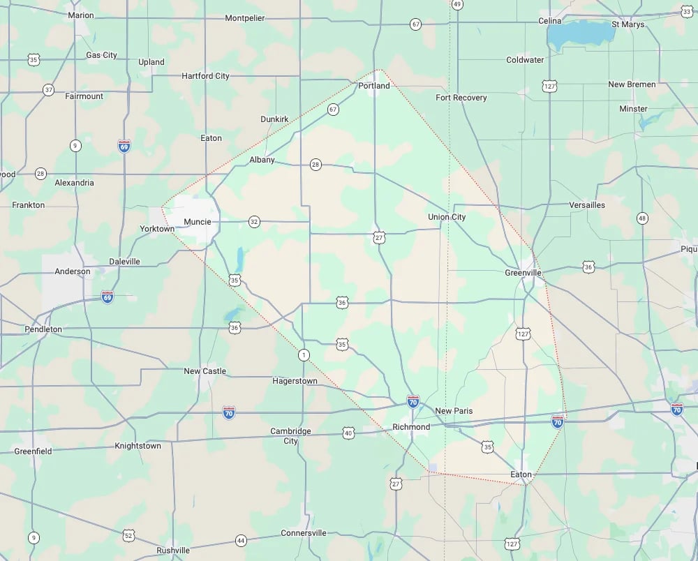 Map of rural Indiana and Ohio showing highways, cities, and county grid lines in green and tan colors
